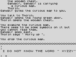 The story above the wavy divider, scrolled up over where Bag End's picture was; below it the input window, with the prompt and the parser's complaint about XYZZY.